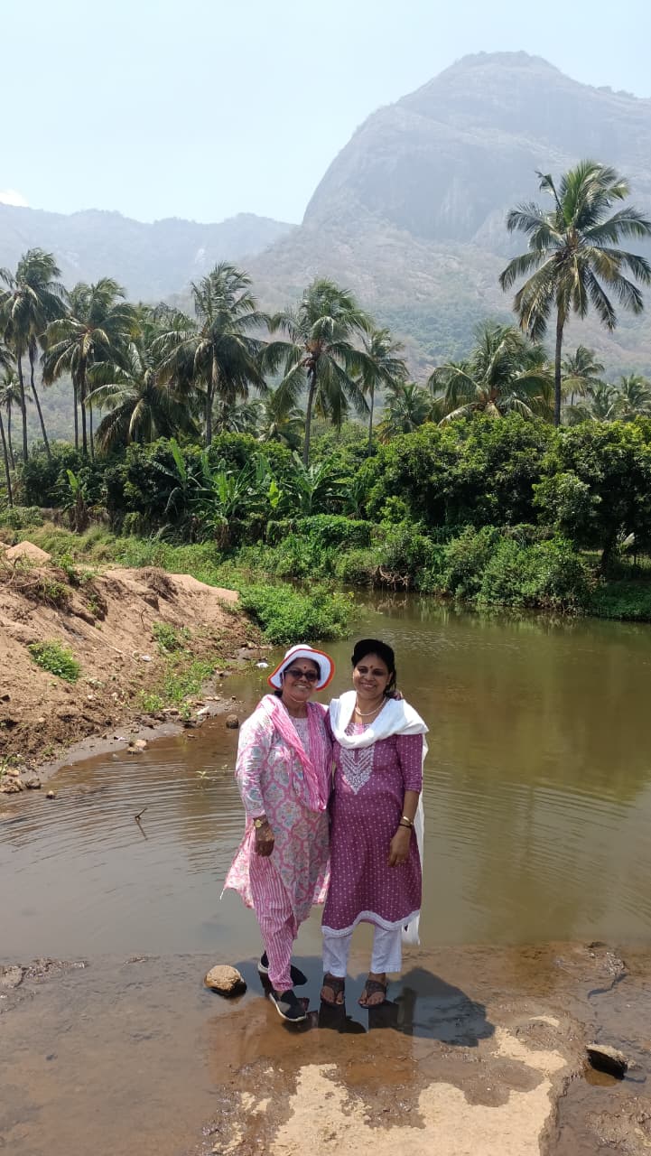 Happy guest enjoying Mango Village Resort